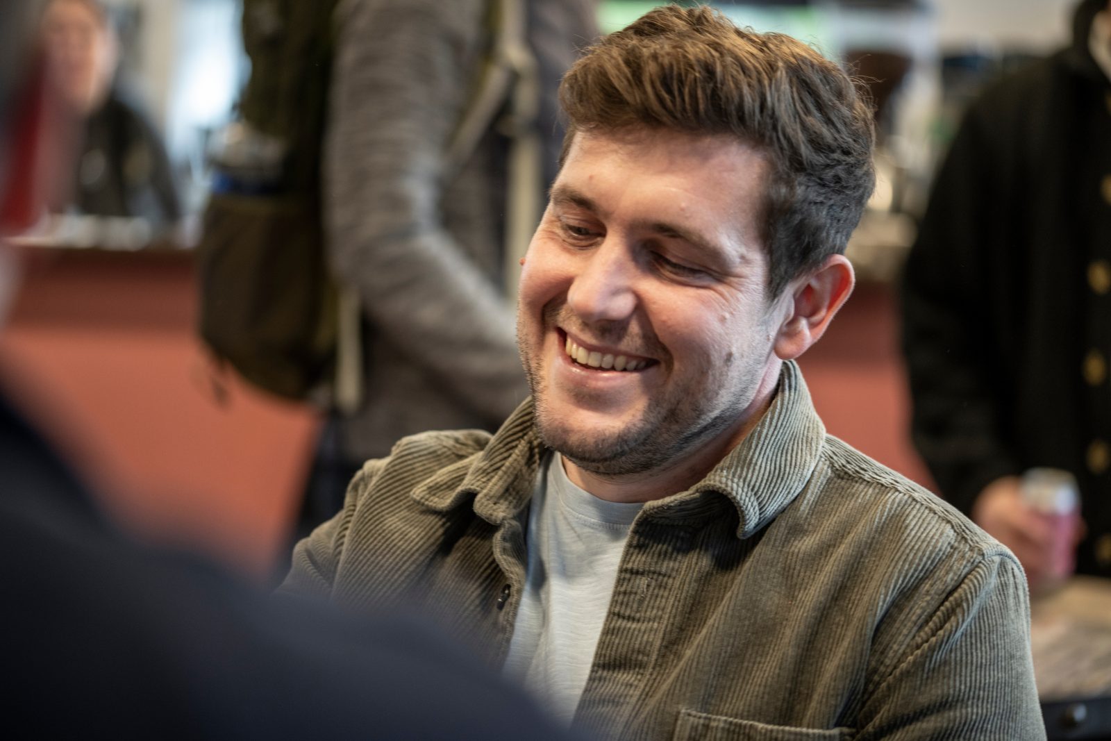 Derek Johnson, founder of Bressummer A.R.K. smiling whilst having a conversation with a client.