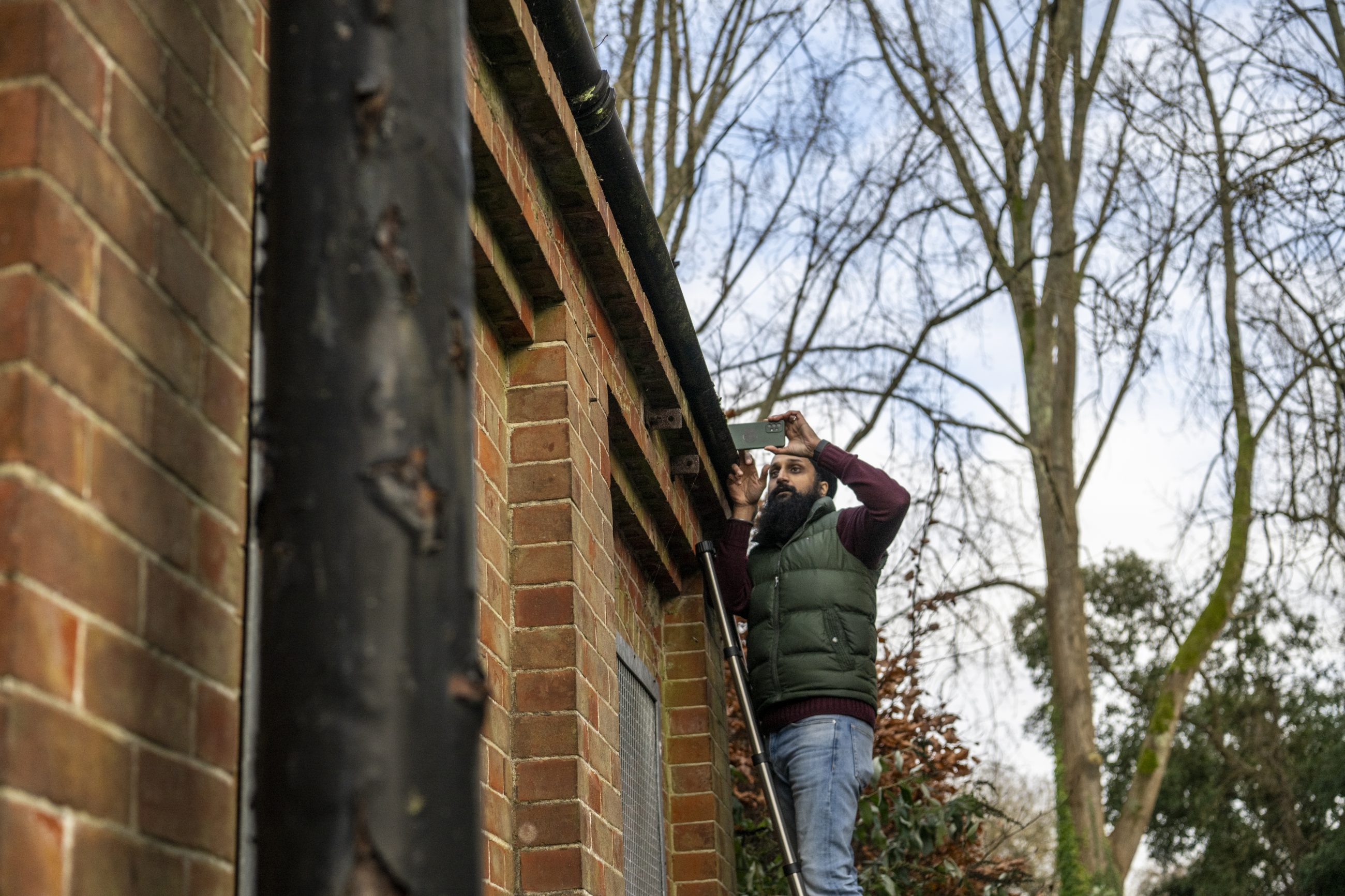 External shot of a solicitors firm, white walls and glass panes with dilapidations surveyor from Bressummer A.R.K conducting a dilapidation survey