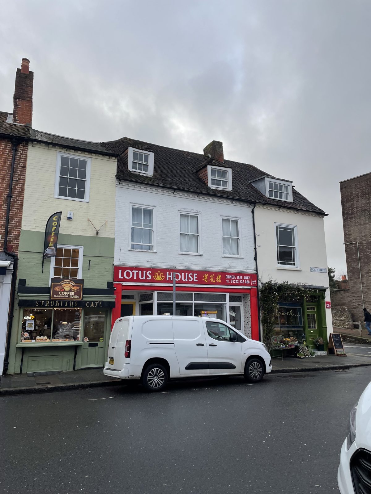 View of the front elevation of a high street building in Chichester.