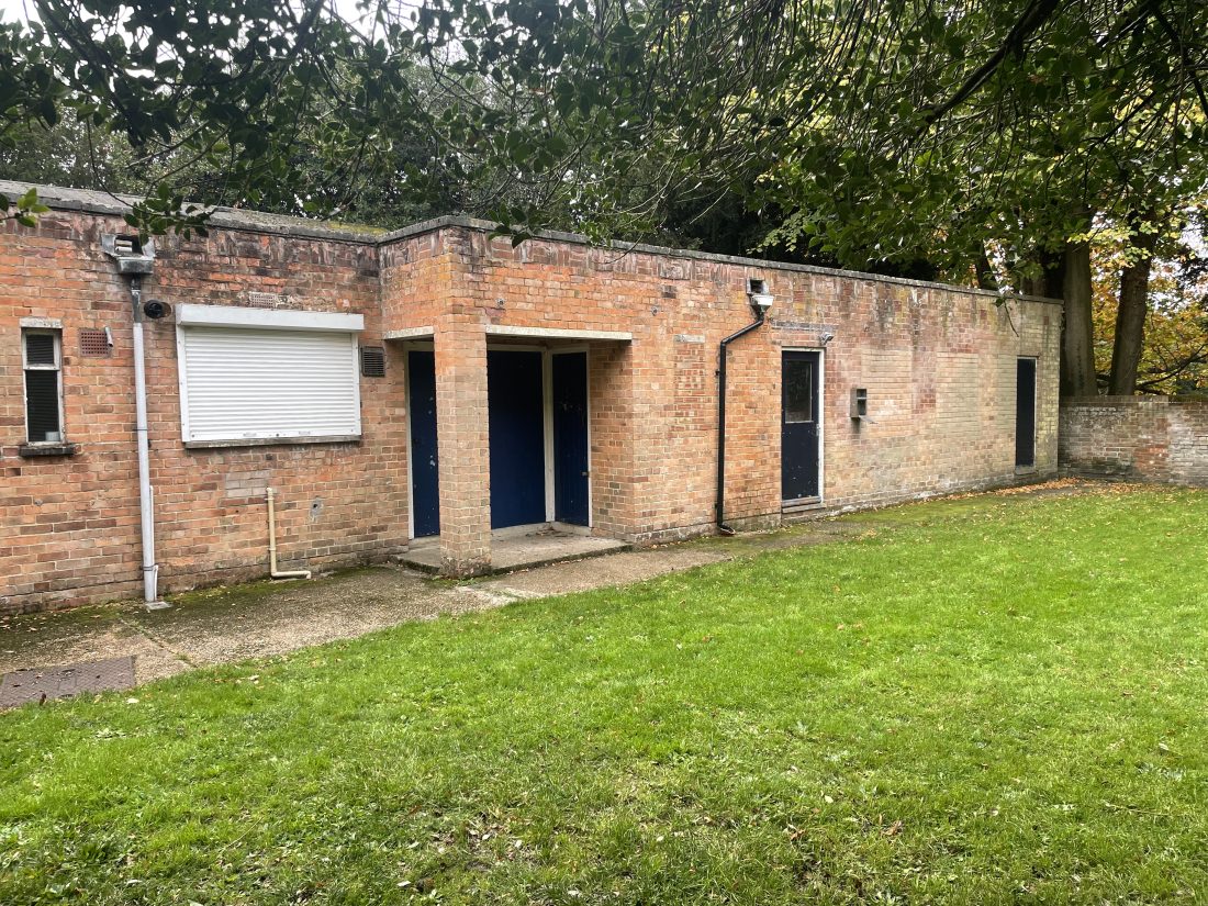 View of the rear external wall of a commercial building.