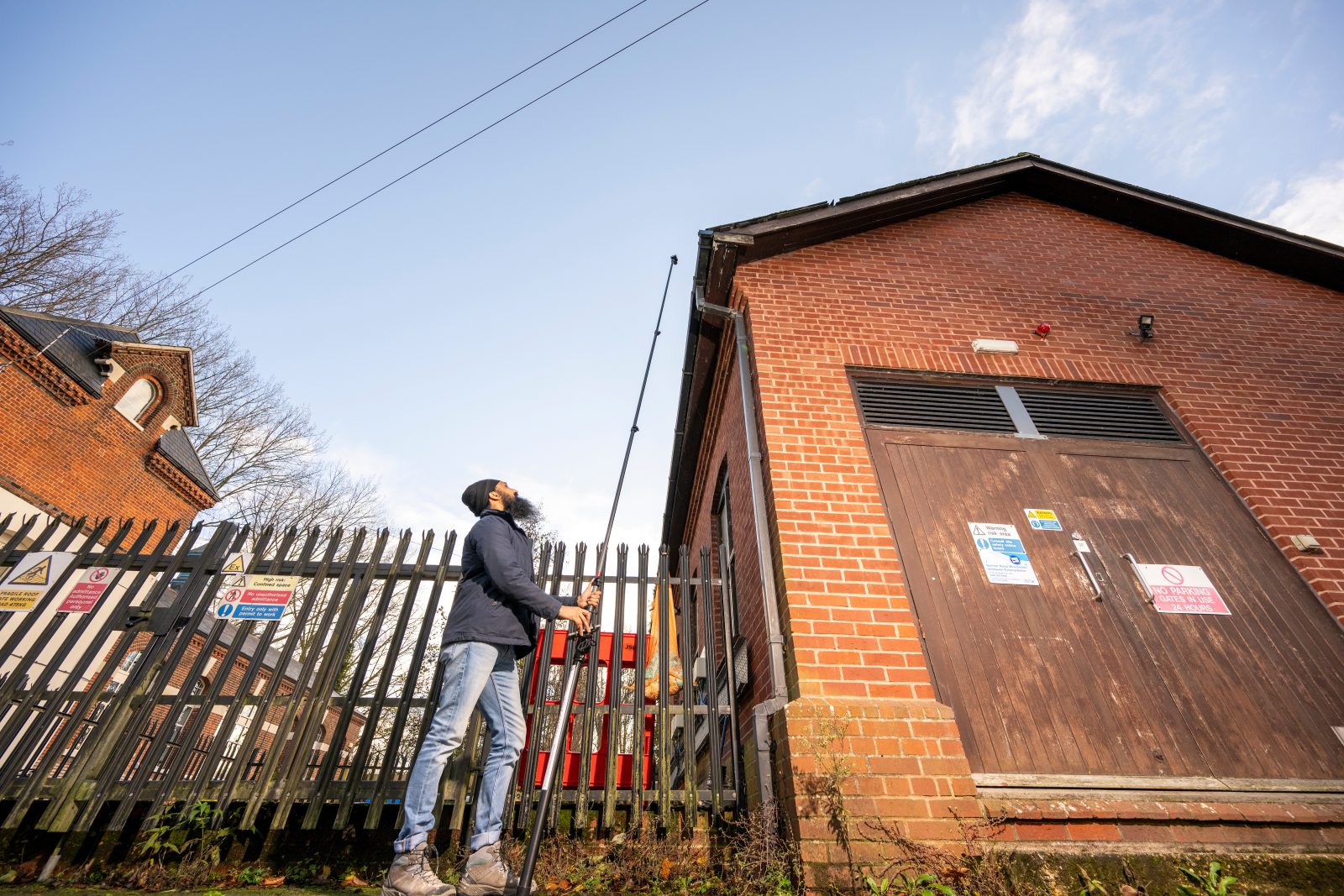 Chartered surveyor inspecting a commercial property in Southampton.